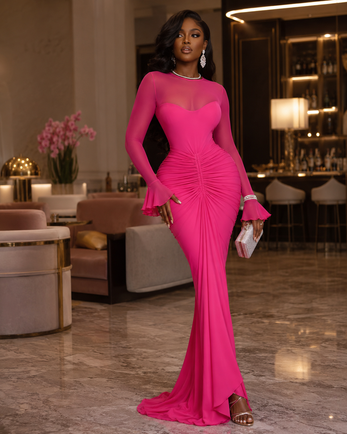 Sculpted ruched long sleeve mermaid maxi dress in rose red, highlighting the curves and flowing into a dramatic hem.