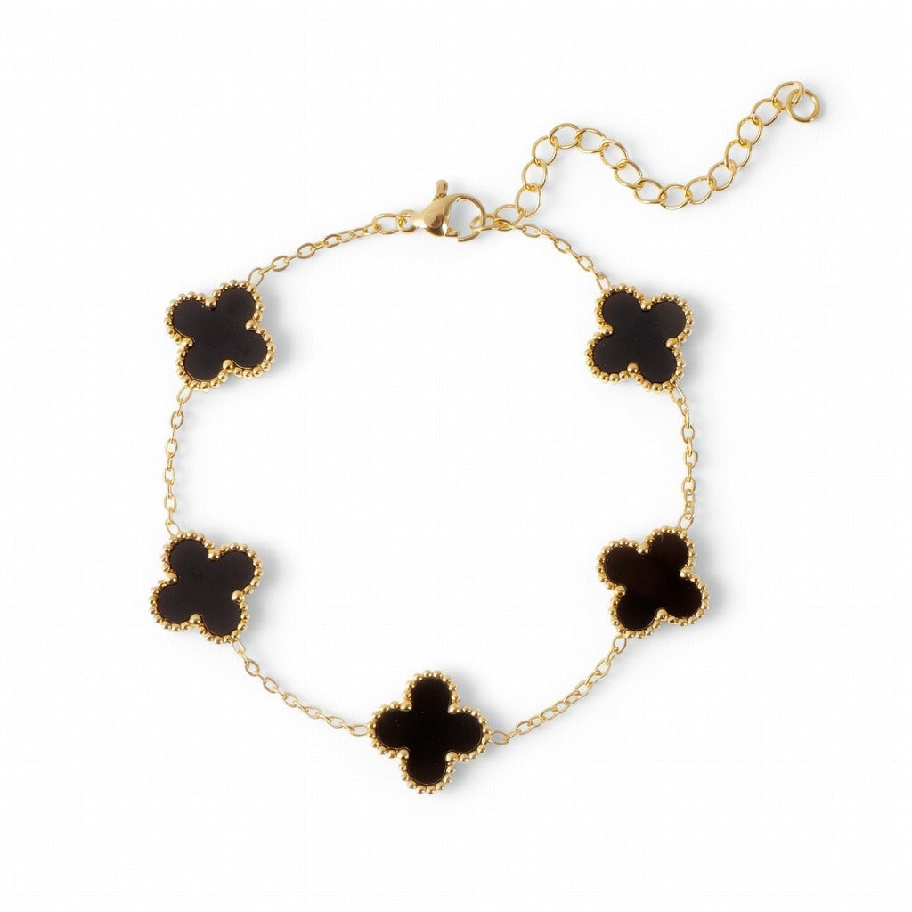 14K gold plated clover bracelet featuring five black onyx charms on a delicate chain.