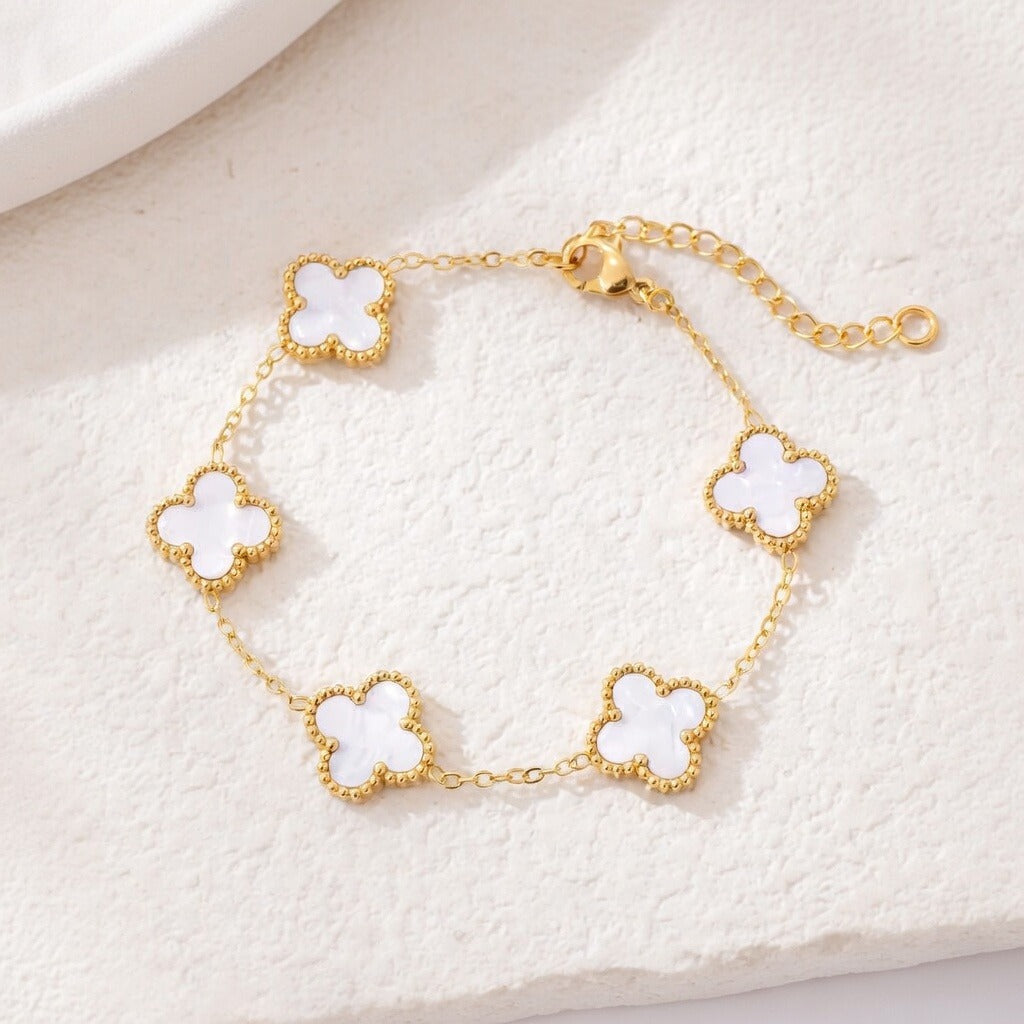 14K Gold Plated Clover Bracelet with Mother of Pearl charms, showcasing elegance and charm.