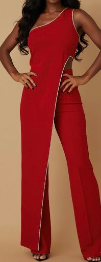 Stunning one shoulder rhinestone set featuring a draped layer top and high-waisted pants, perfect for glamorous occasions.