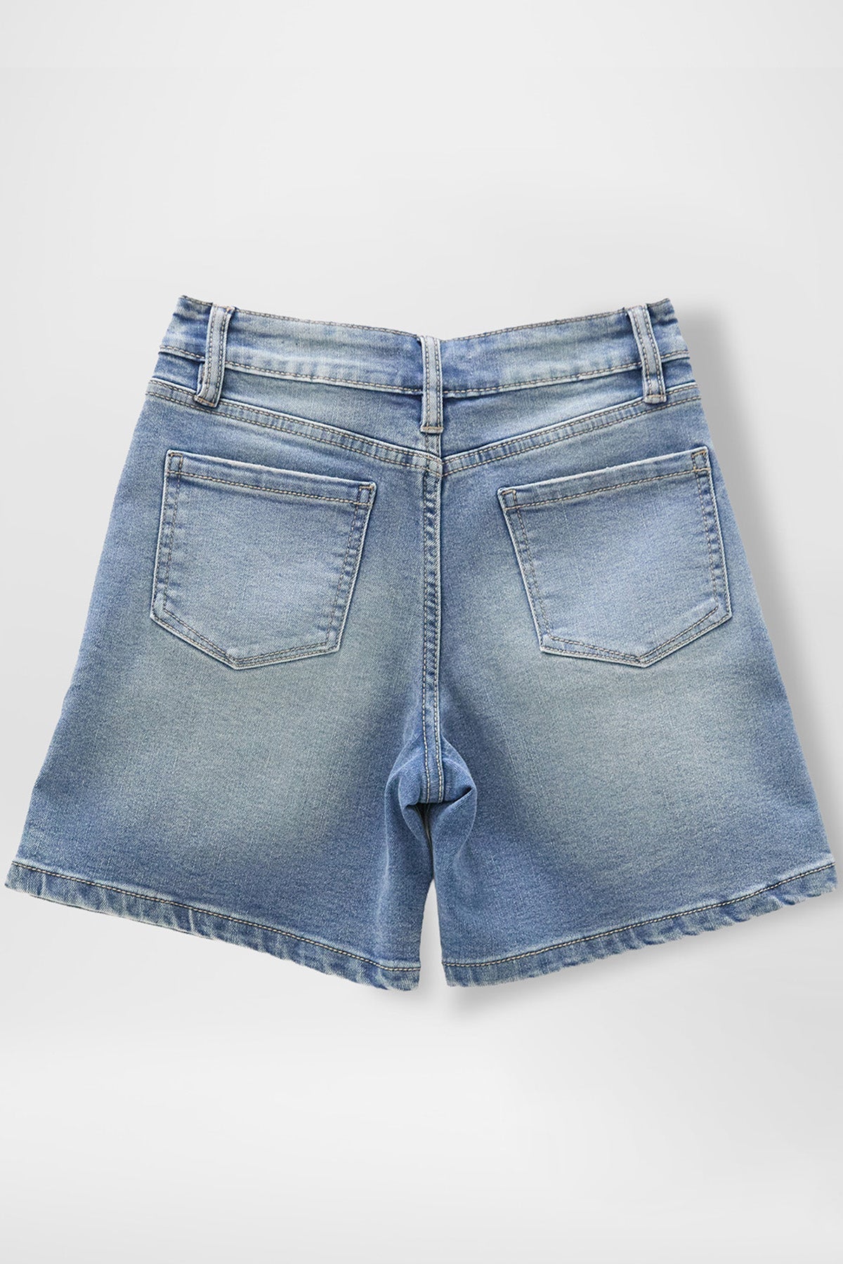Alt Tag: Back view of girls front pleat denim jorts with belt loops and classic 4-pocket layout