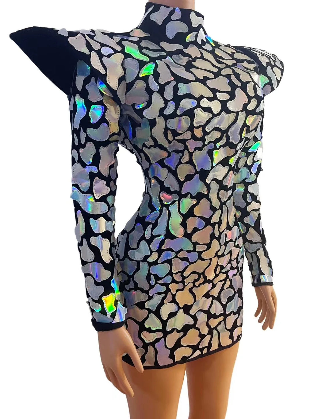 Alt Tag: Galaxy Armor Holographic Mini Dress with reflective holographic appliqués, sculpted mini silhouette and exaggerated shoulders