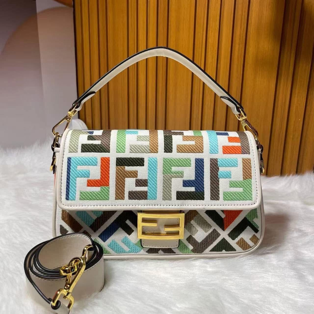Designer handbag with geometric pattern on a white surface