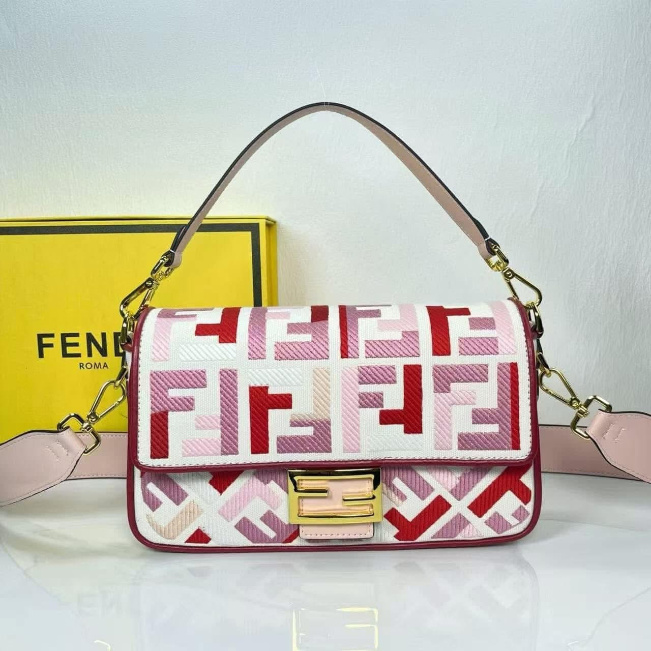 Handbag with pink and red pattern on a white background