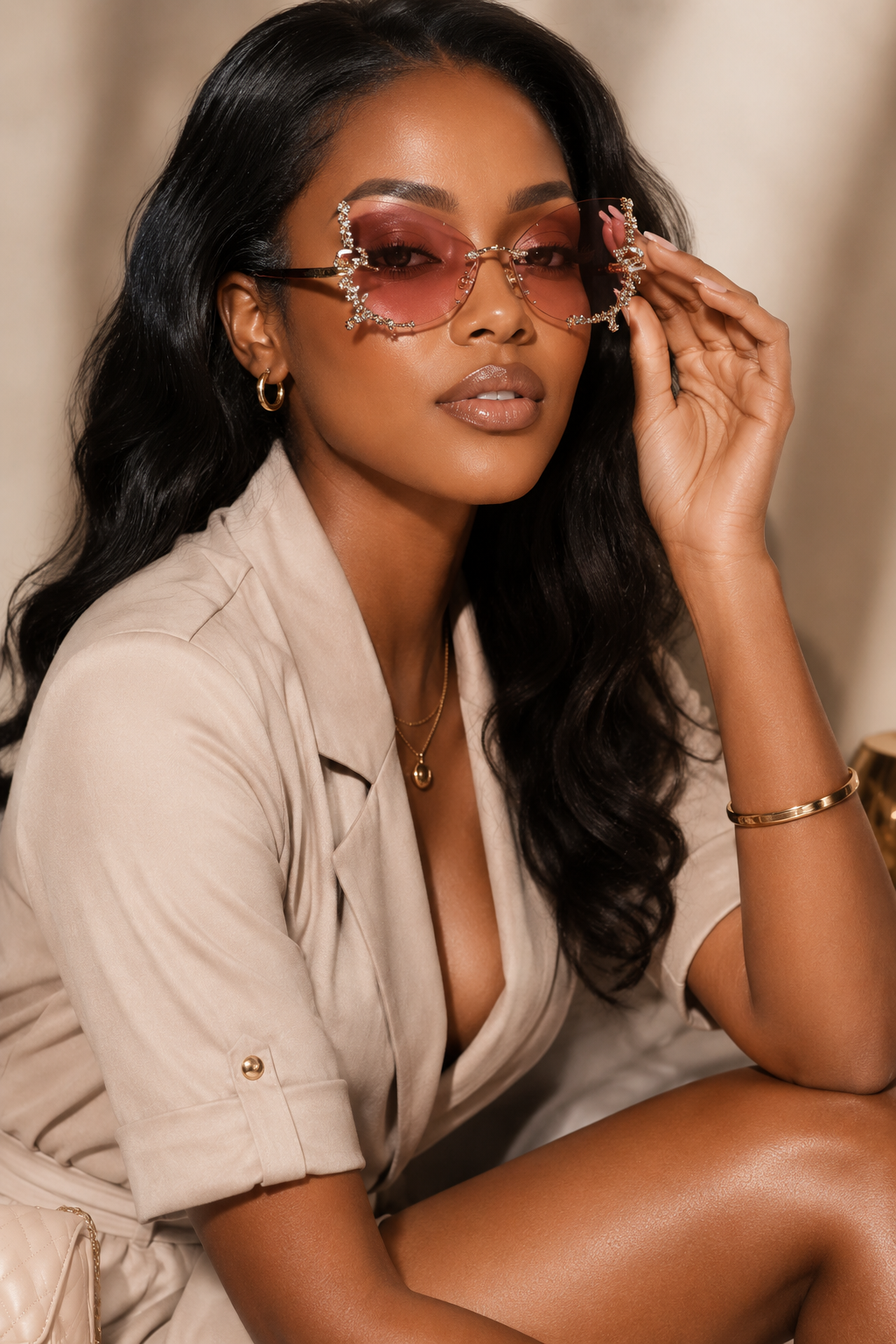 Rimless butterfly sunglasses by Rose In Concrete with clear lenses and stylish, modern design.