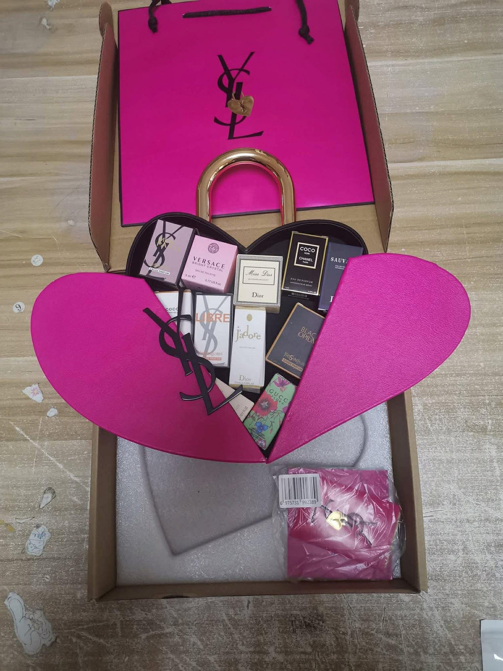Alt Tag: Heart Shaped Assorted Perfume Box Set with mini fragrance bottles in pink heart gift packaging, ideal for sampling, travel, and gifting
