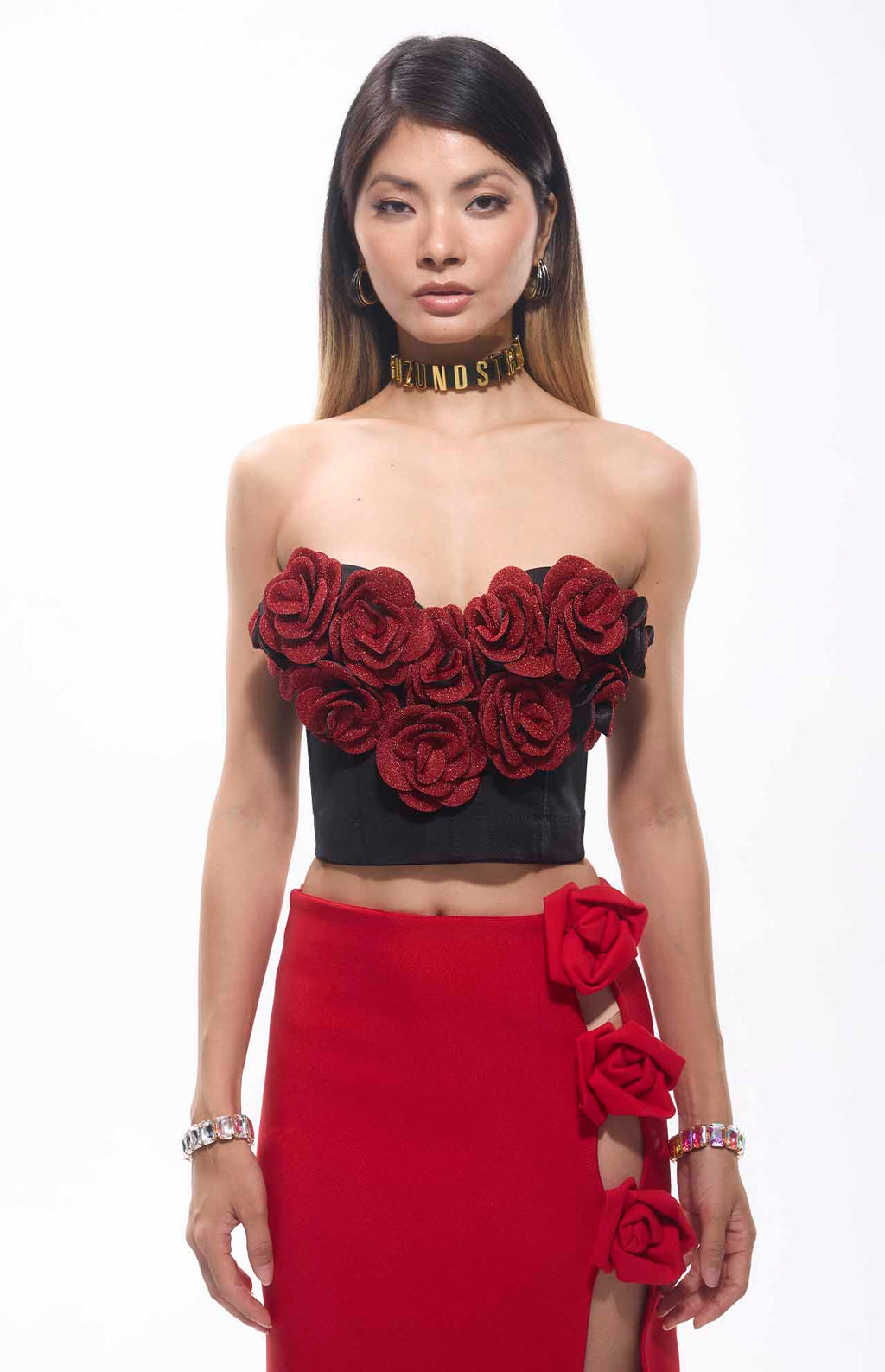 Flower Patch Corset Mini Top with red floral accents, perfect for bold events and dramatic looks.
