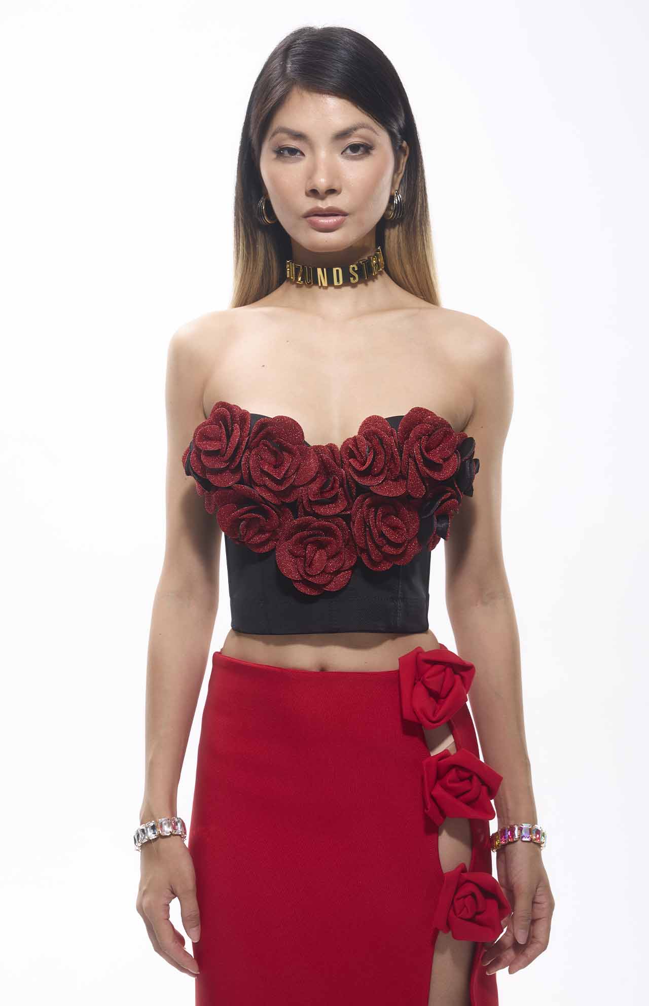 Flower Patch Corset Mini Top with red floral accents, perfect for bold events and dramatic looks.