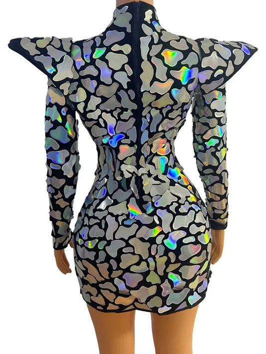 Alt Tag: Galaxy Armor Holographic Mini Dress back view with sculpted waist, exaggerated shoulders and reflective holographic appliqués