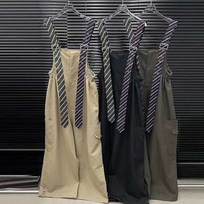 Executive Street Suspender Jumpsuit in three colors with stylish ties and pockets.