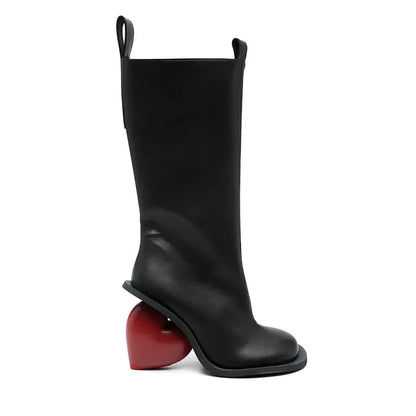 Heartbreak Heeled Mid-Calf Boots in black microfiber leather with curved heart heel, sculptural runway statement for women