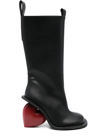 Alt Tag: Heartbreak Heeled Mid-Calf Boots in black microfiber leather with sculptural curved heart heel, runway-ready statement boot