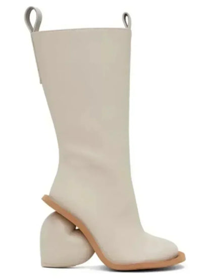 Alt Tag: Heartbreak Heeled Mid-Calf Boots in ivory microfiber leather with curved heart heel, sculptural runway-ready women’s fashion boot
