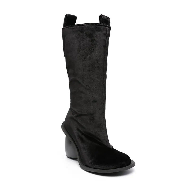 Heartbreak Heeled Mid-Calf Boots for women in black microfiber leather with sculptural curved heart heel, runway statement mid-calf boot