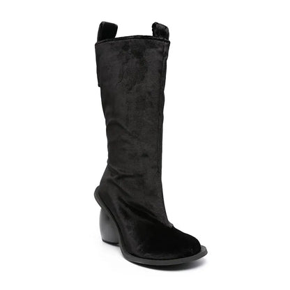 Heartbreak Heeled Mid-Calf Boots for women in black microfiber leather with sculptural curved heart heel, runway statement mid-calf boot