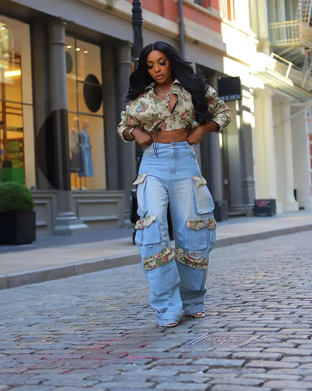 Alt Tag: Floral Bomber Crop Jacket & Cargo Patchwork Wide-Leg Jean Set on model, floral cropped bomber and high-waisted patchwork wide-leg cargo jeans