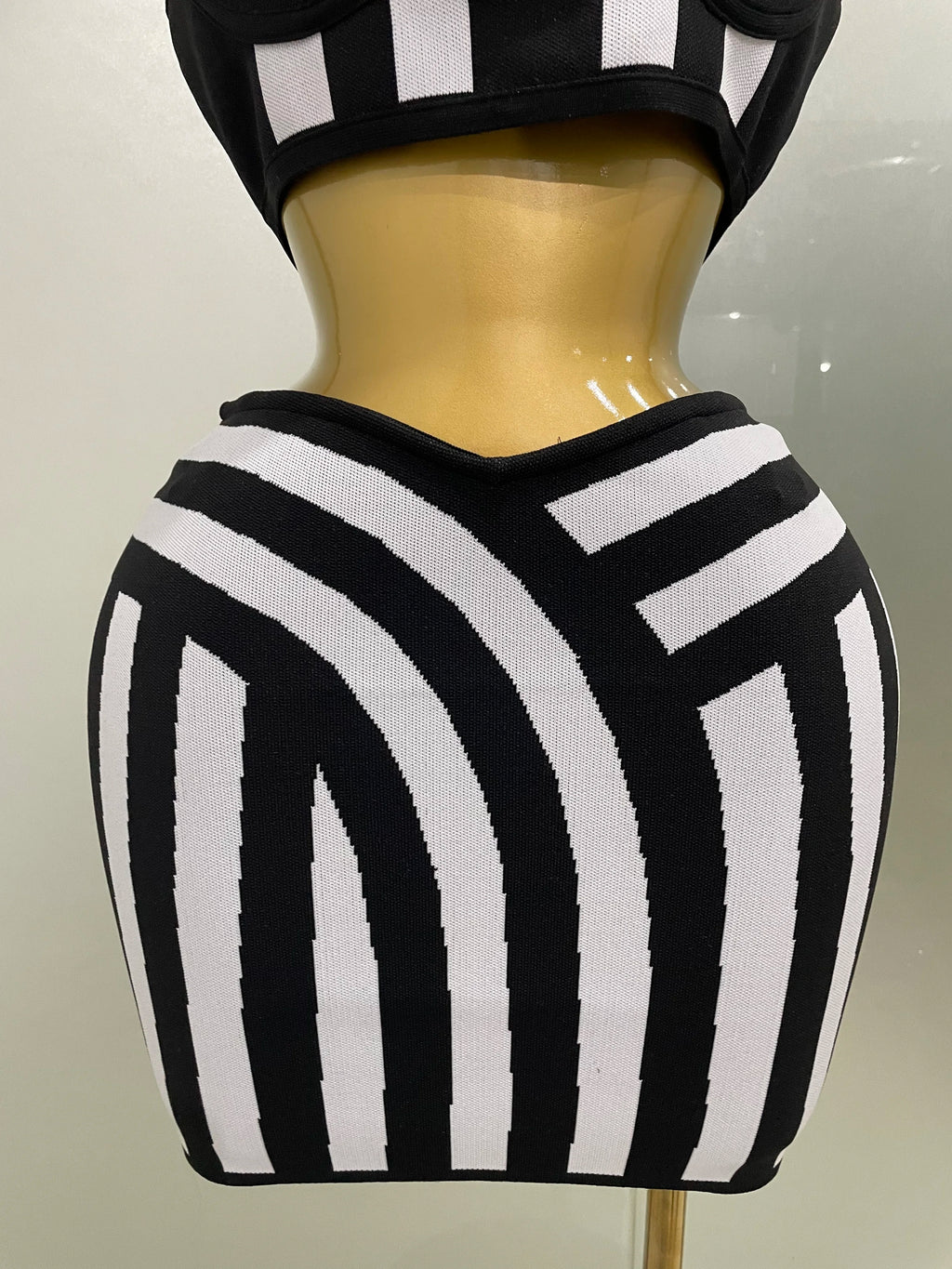 Alt Tag: Optical Illusion Halter Bandage 2-Piece Set black-and-white striped bandage skirt with geometric optical pattern, bodycon fit