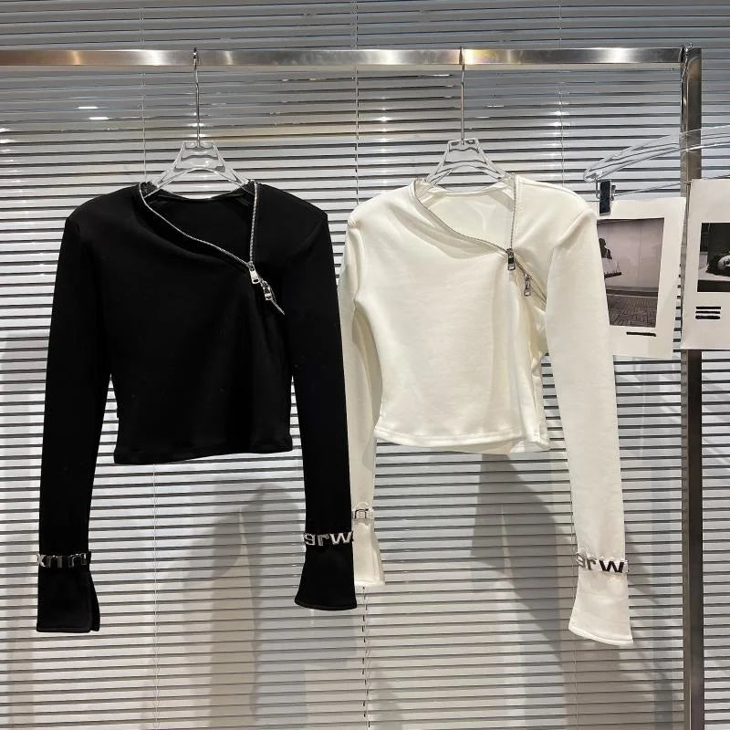 Alt Tag: Asymmetric Zip Sculpt Long-Sleeve Top – Minimalist Streetwear Cutout Tee in black and white, diagonal zip long-sleeve tops on hangers