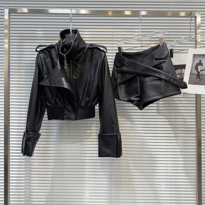 faux leather mini set with jacket and shorts displayed on a hanger with a modern background