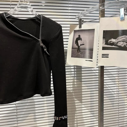 Alt Tag: Asymmetric Zip Sculpt Long-Sleeve Top – Minimalist Streetwear Cutout Tee black long-sleeve top with diagonal zipper and wrist accents