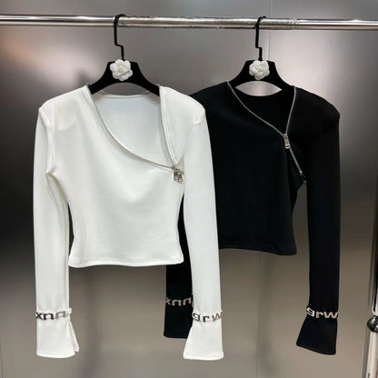 Asymmetric zip streetwear top in white and black, showcasing a sleek minimalist design and unique zip detail.