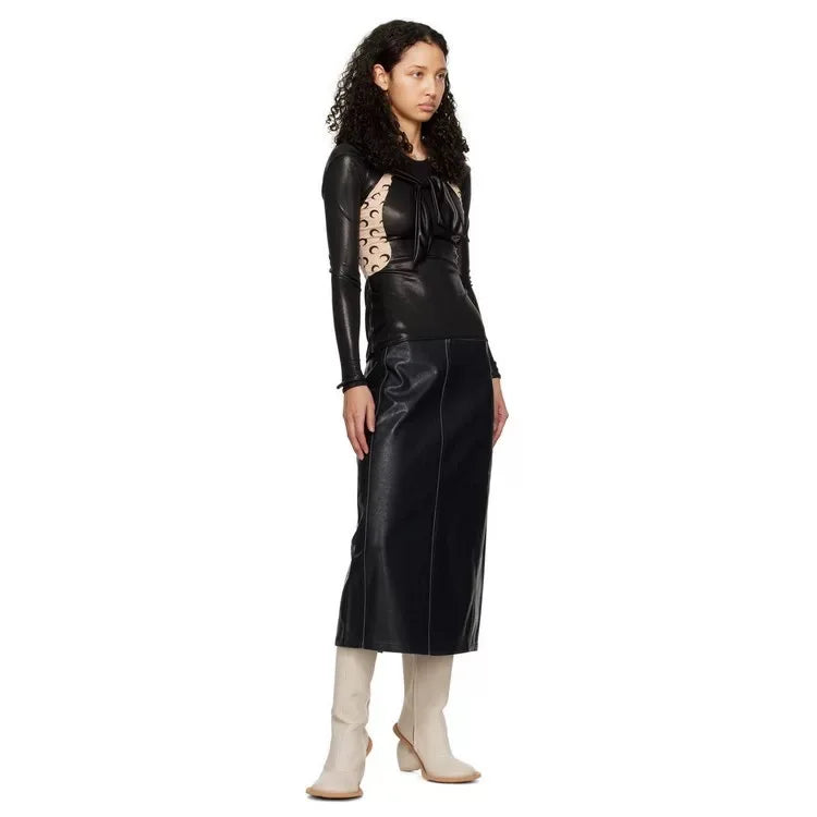Heartbreak Heeled Mid-Calf Boots worn with black leather midi dress, curved heart heel statement women’s fashion boots