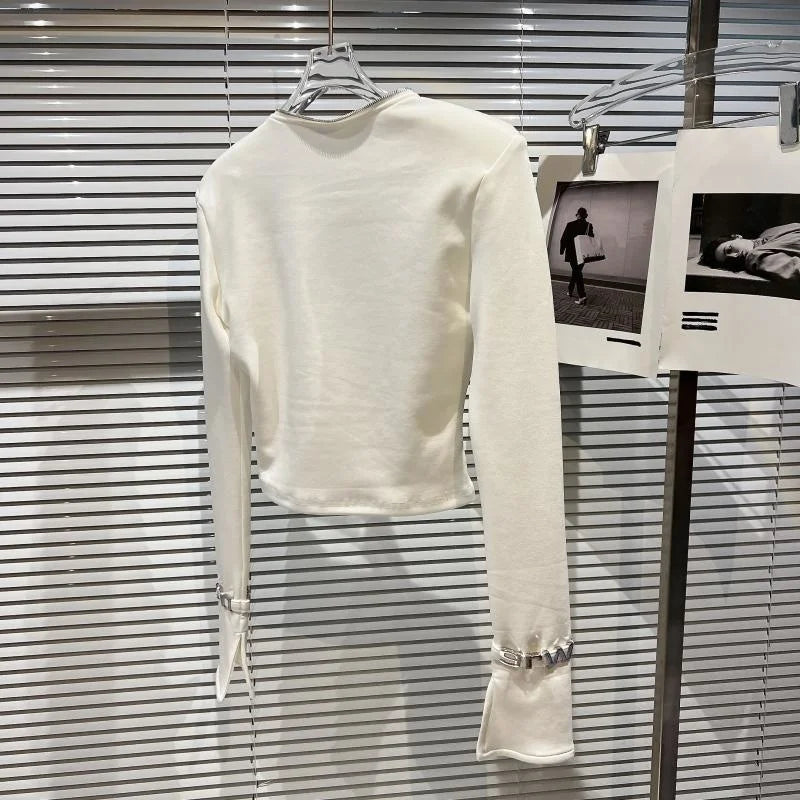 Alt Tag: Asymmetric Zip Sculpt Long-Sleeve Top – Minimalist Streetwear Cutout Tee in white, cropped long-sleeve with wrist cutout accents