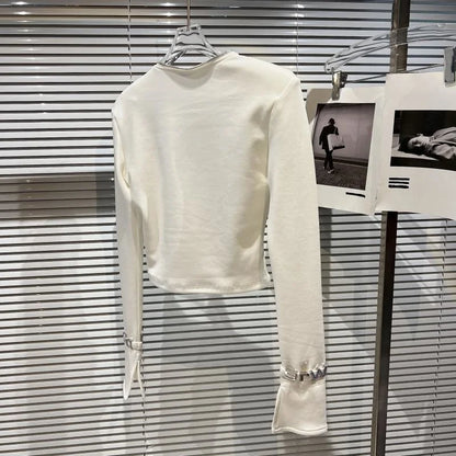 Alt Tag: Asymmetric Zip Sculpt Long-Sleeve Top – Minimalist Streetwear Cutout Tee in white, cropped long-sleeve with wrist cutout accents