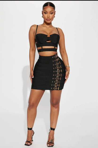 Sculpted Buckle Bandage 2-Piece Set black bustier crop top and buckle mini skirt with cutout waist straps, body-hugging fit