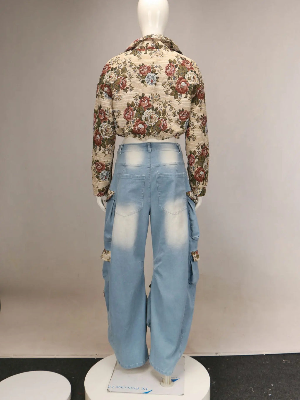 Alt Tag: Back view Floral Bomber Crop Jacket & Cargo Patchwork Wide-Leg Jean Set with floral cropped bomber and high-waisted wide-leg cargo jeans