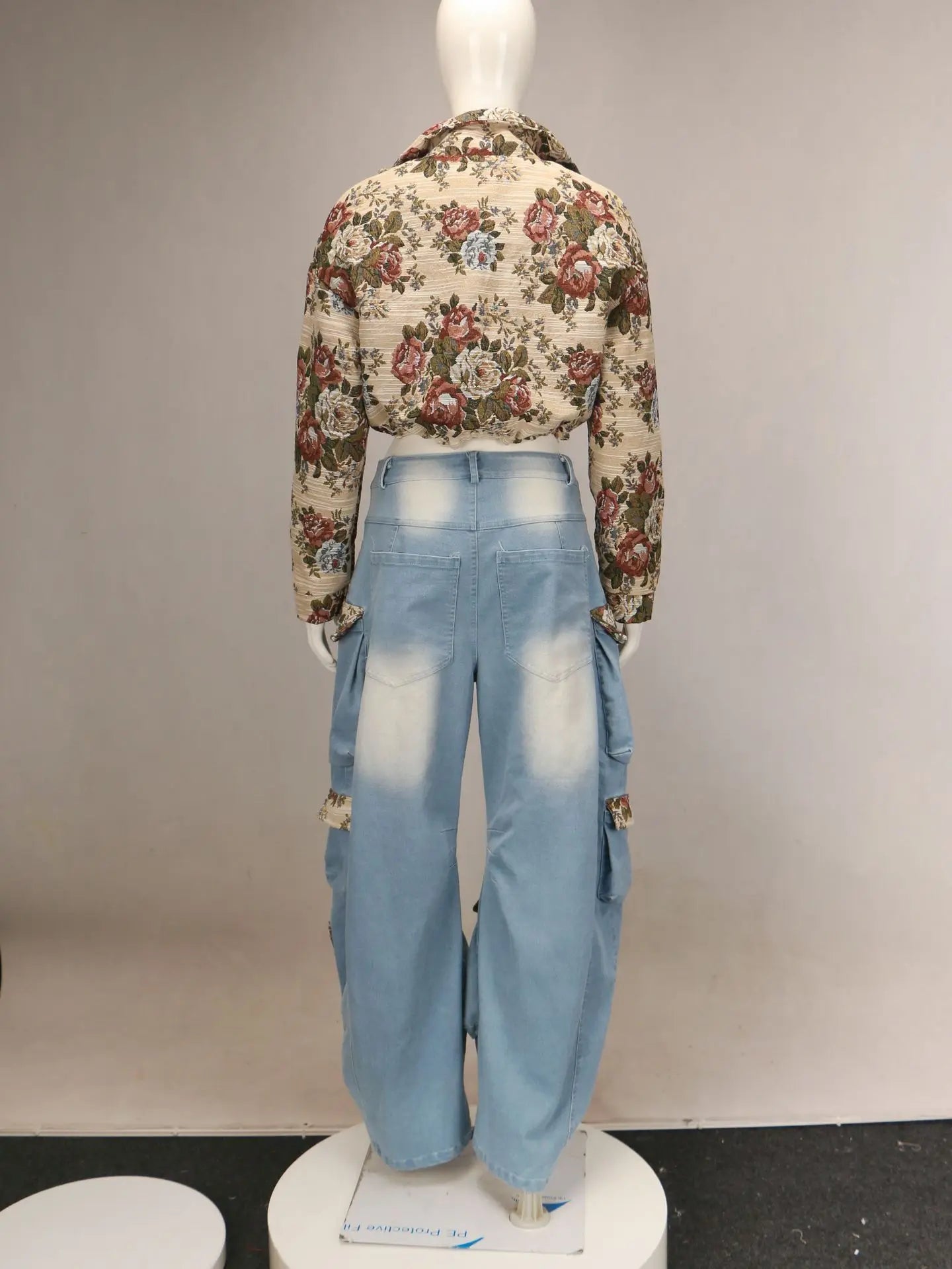Alt Tag: Back view Floral Bomber Crop Jacket & Cargo Patchwork Wide-Leg Jean Set with floral cropped bomber and high-waisted wide-leg cargo jeans