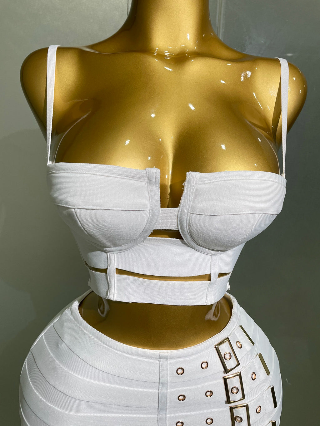 Sculpted Buckle Bandage 2-Piece Set white bandage bustier crop top with cutout waist straps and buckle-detail skirt