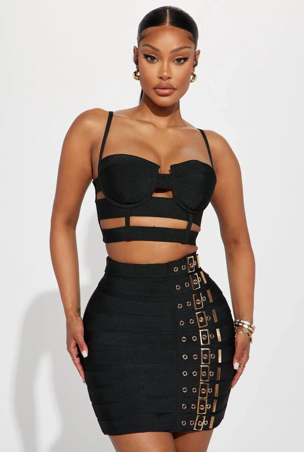 Sculpted Buckle Bandage 2-Piece Set black bustier crop top with cutout straps and buckle mini skirt, figure-sculpting bandage fit