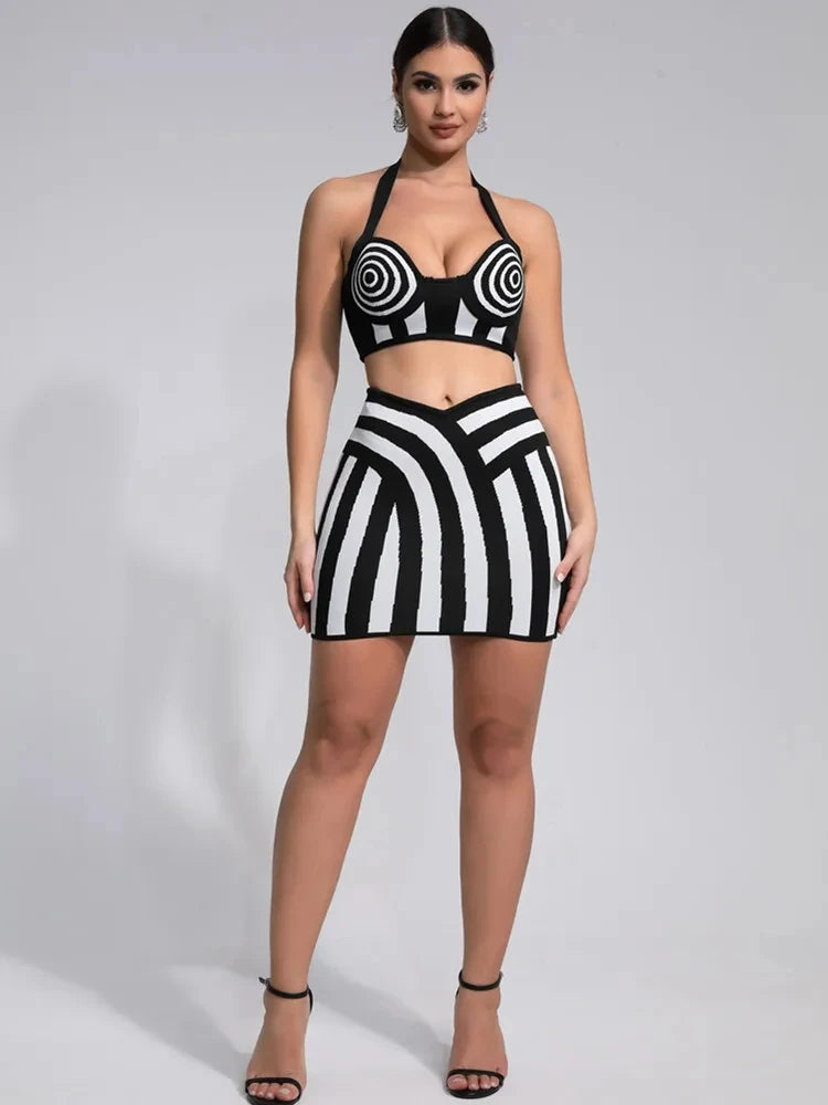 Optical illusion bandage set featuring a halter top and fitted skirt in striking black-and-white patterns.