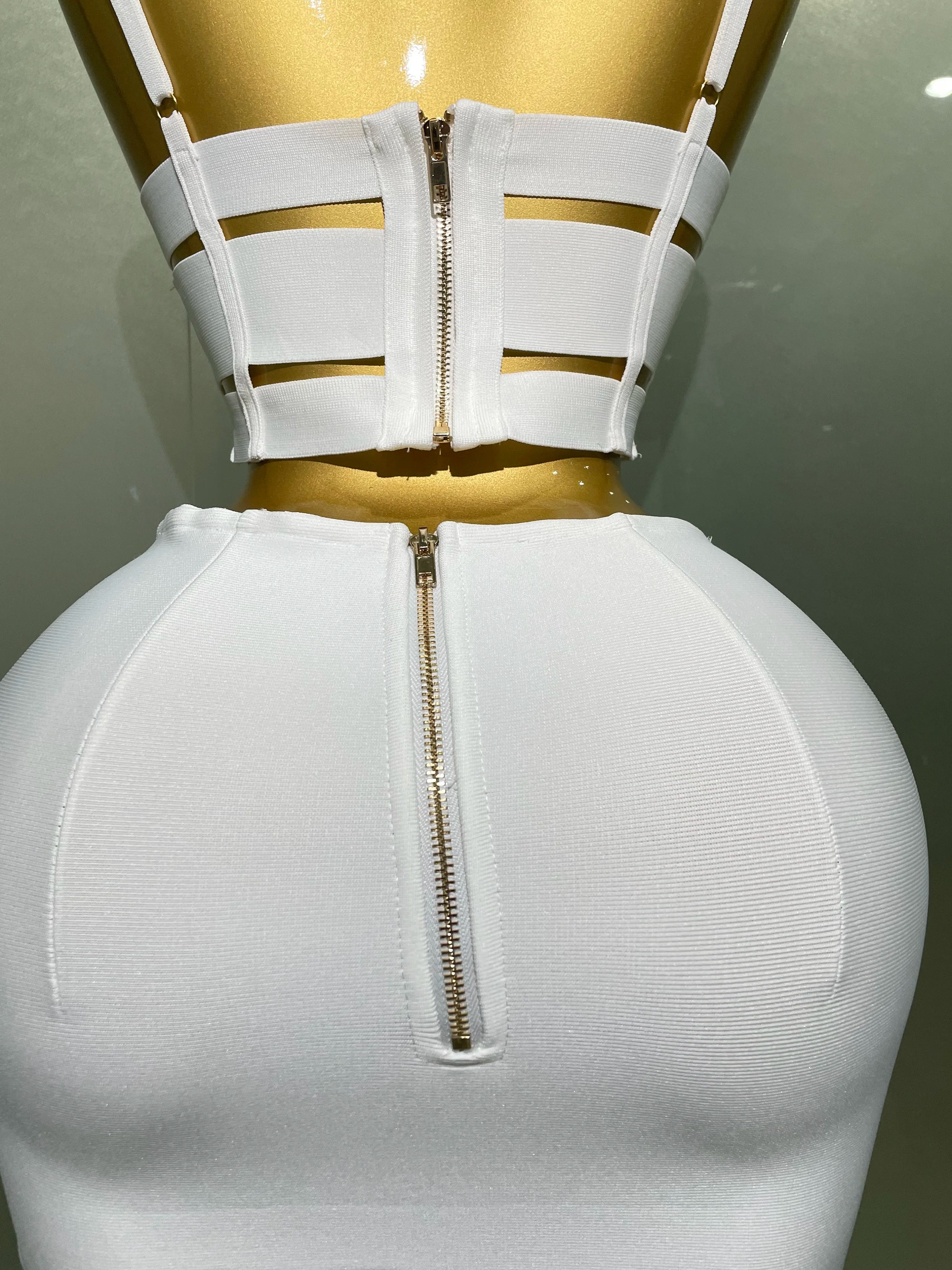 Sculpted Buckle Bandage 2-Piece Set white bandage bustier crop top and high-waist skirt with zipper detail