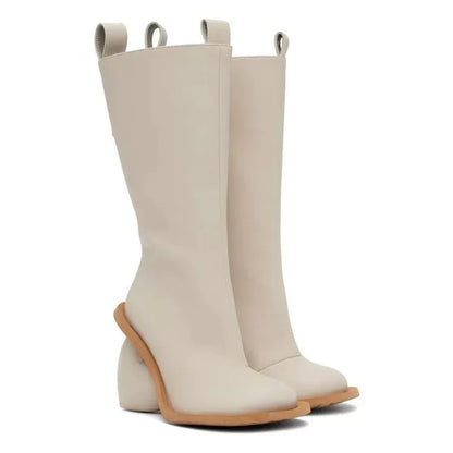 Alt Tag: Heartbreak Heeled Mid-Calf Boots in cream microfiber leather with curved heart heel, sculptural fashion mid-calf boots for women