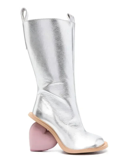 Heartbreak Heeled Mid-Calf Boots in silver microfiber leather with curved heart heel, sculptural statement women’s fashion boot