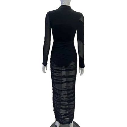 Alt Tag: Black Velvet + Mesh Illusion back view mock-neck bodysuit with sheer mesh panels and ruched maxi skirt, sculpting evening set