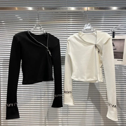 Alt Tag: Asymmetric Zip Sculpt Long-Sleeve Top – Minimalist Streetwear Cutout Tee in black and white, diagonal zip long-sleeve crop top