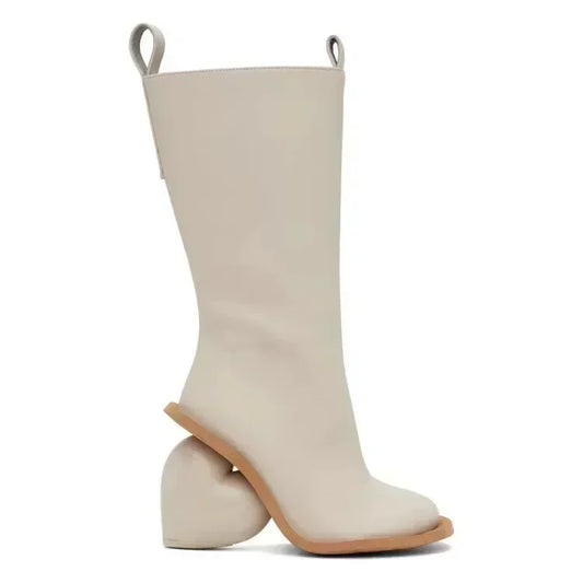 Alt Tag: Heartbreak Heeled Mid-Calf Boots in cream microfiber leather with sculptural curved heart heel, side view
