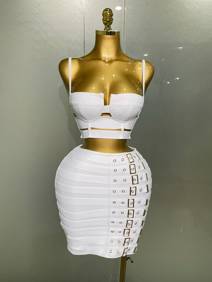 Sculpted buckle bandage bustier mini skirt set in white, featuring a structured crop top and high-waisted skirt with buckle straps.