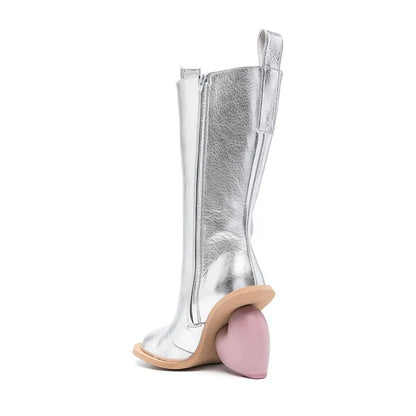Alt Tag: Heartbreak Heeled Mid-Calf Boots in metallic silver microfiber leather with curved heart heel and side zipper, rear view