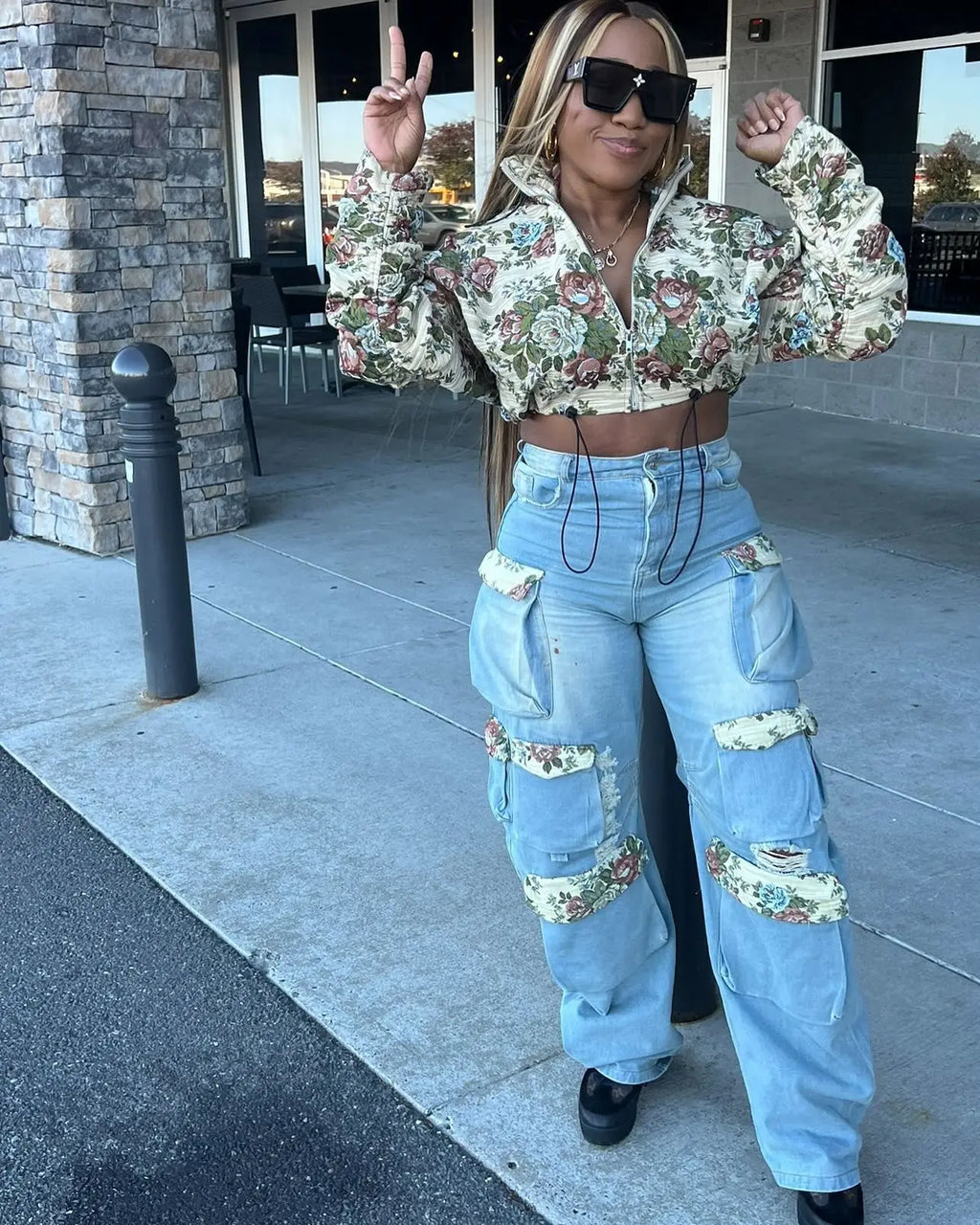 Floral Bomber Crop Jacket & Cargo Patchwork Wide-Leg Jean Set worn with floral cropped bomber and high-waisted patchwork wide-leg cargo jeans