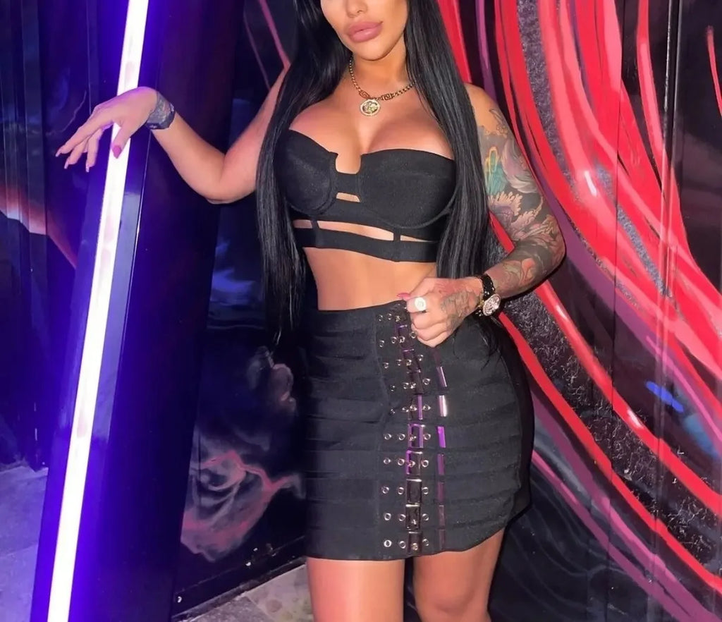 Alt Tag: Sculpted Buckle Bandage 2-Piece Set black bustier crop top and high-waist mini skirt with buckle detail, figure-sculpting bandage fit