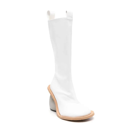 Alt Tag: Heartbreak Heeled Mid-Calf Boots in white microfiber leather with sculptural curved heart heel, runway-ready statement women's boots