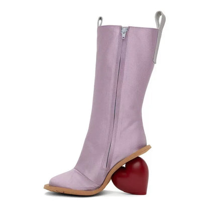 Alt Tag: Heartbreak Heeled Mid-Calf Boots in lavender microfiber leather with curved heart heel, side zipper, runway statement women’s boots