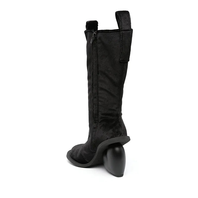 Alt Tag: Heartbreak Heeled Mid-Calf Boots in black microfiber leather, rear view with sculptural curved heart heel and zip closure