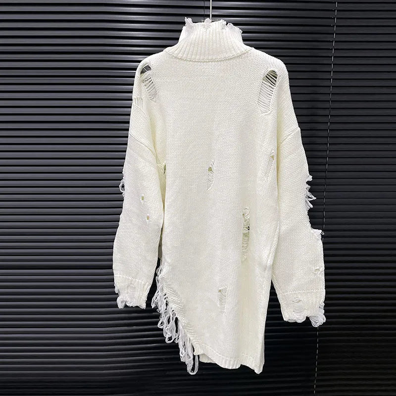 Distressed Half-Zip High Collar Knit Sweater in white with shredded detailing and oversized fit, hanging on rack
