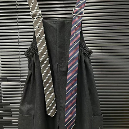 Executive Street Suspender Jumpsuit with stylish striped suspenders in black and gray colors.