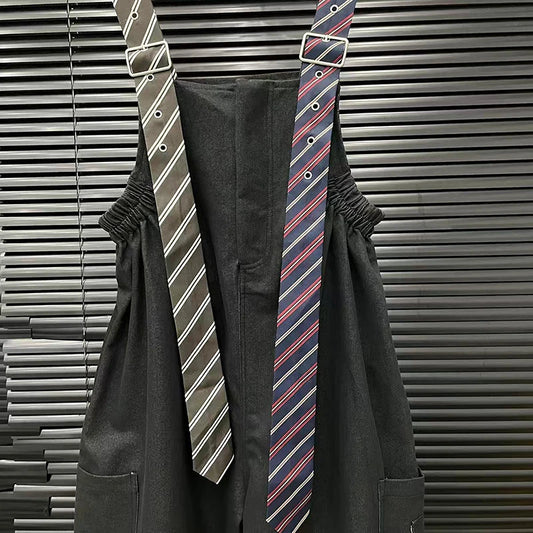 Executive Street Suspender Jumpsuit with stylish striped suspenders in black and gray colors.